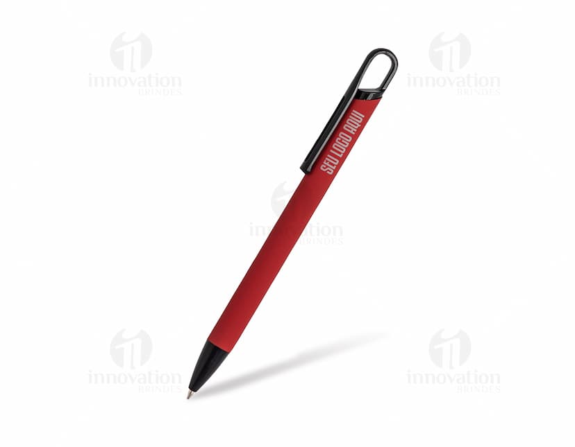 Caneta de metal prateada sobre papel branco, representando um ambiente de escritório ou negócios.
