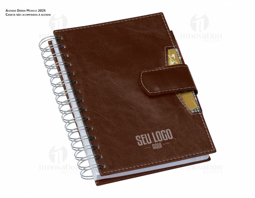 Agenda Wire-o com capa azul, espaço para anotações e espiral na lateral.