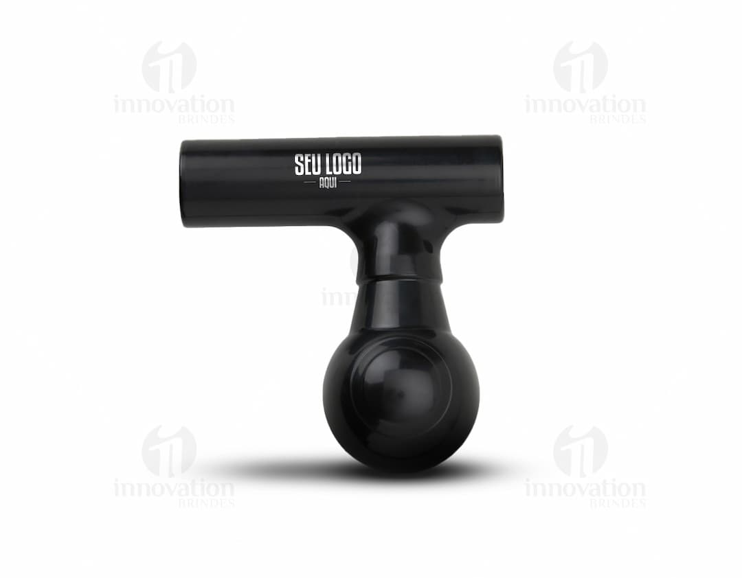 Massageador portátil de cor rosa, com design compacto e botões de controle na parte frontal.