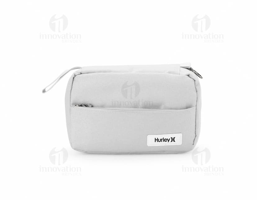 Necessaire com 3 compartimentos em tons de azul e branco.