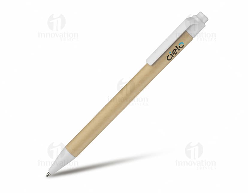 Bloco de anotações com planejamento aberto em uma mesa de escritório. No bloco, é possível ver páginas decoradas e datas planejadas. Além disso, há canetas e clips ao redor do bloco.