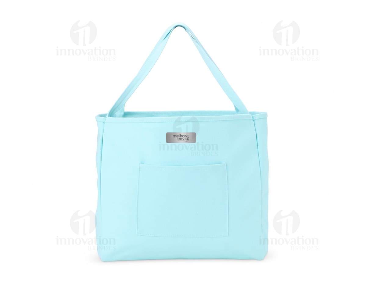 Bolsa de Lona quadriculada nas cores verde e branca, com alça de ombro e fecho de zíper na parte superior.