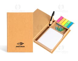 Block de notas autocolante y bolígrafo juntos en una mesa.