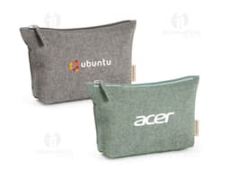 Borsa in cotone di colore beige, con manici corti e dettagli marroni. Presenta una tasca frontale con zip e una delicata