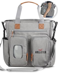 Bolsa multifuncional preta de couro, estilo moderno e elegante, com alça de mão e alça de ombro ajustável. Possui zíper, bolsos com fivela, fecho de metal e bolso interno. Ideal para viagens, trabalho ou uso casual.