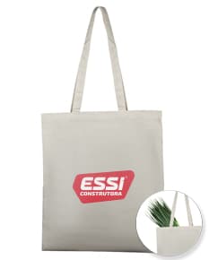 Bolsa de Algodão 180g/m² marrom e surpresa, vazia, com alça de plástico e design moderno, em um cenário de estúdio luxuoso.