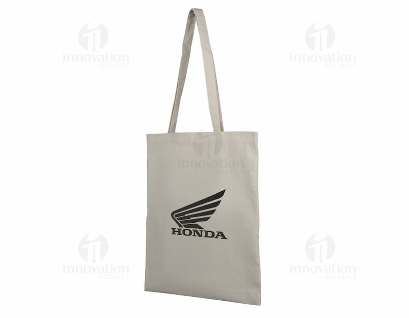 Bolsa de Algodão 180g/m² marrom e surpresa, vazia, com alça de plástico e design moderno, em um cenário de estúdio luxuoso.