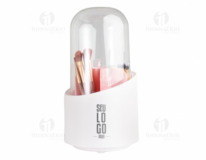 Organizador de pincéis colorido e brilhante contendo diversos tipos de pincéis, lápis, batons e outros acessórios de maquiagem. Acessório de higiene e cuidados pessoais com design moderno e prático para organizar seus itens de beleza.