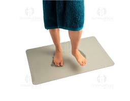 Light blue rug with prominent floral patterns.