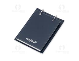 Bloco de Anotacao de Mesa em papel kraft com folhas brancas e caneta preta ao lado.