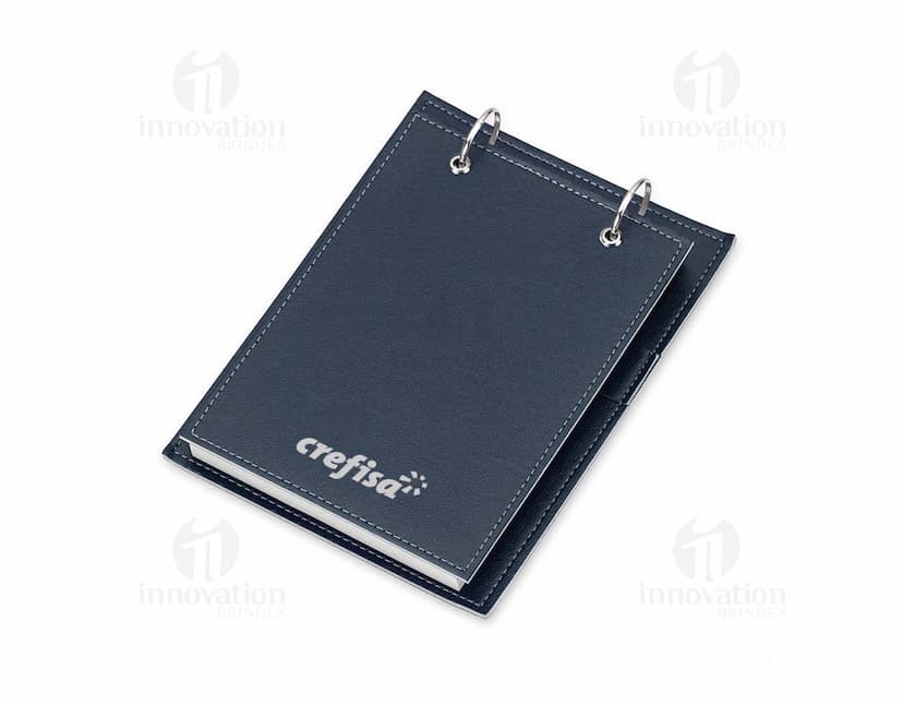Bloco de Anotacao de Mesa em papel kraft com folhas brancas e caneta preta ao lado.