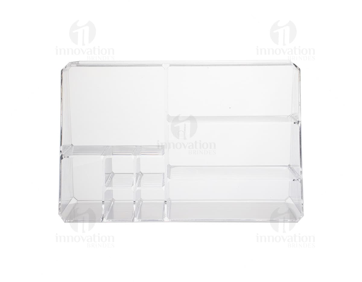 Organizador Acrílico transparente com cinco divisórias para armazenamento de objetos.