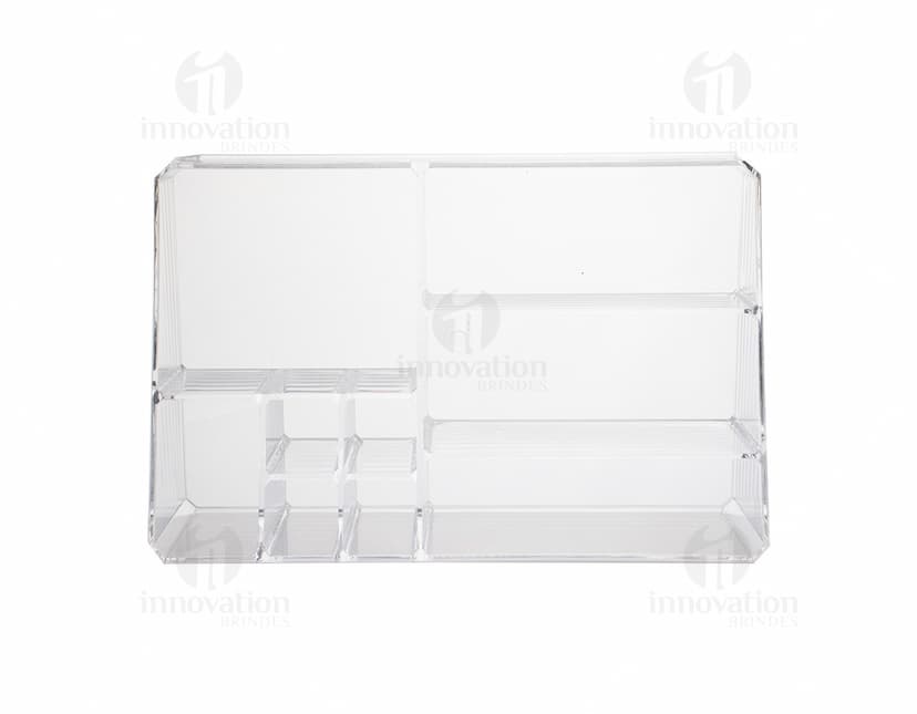Organizador Acrílico transparente com cinco divisórias para armazenamento de objetos.