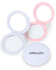 Espelho Duplo Plástico com base em plástico resistente, dobrável ao meio, ideal para maquiagem e cuidados com a pele.
