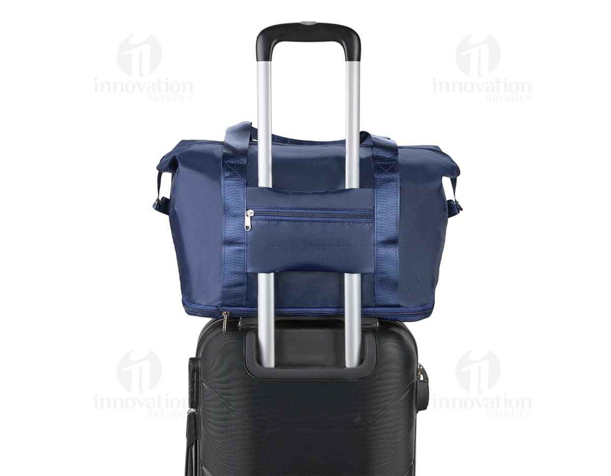 Bolsa expansível e dobrável de 25 litros.