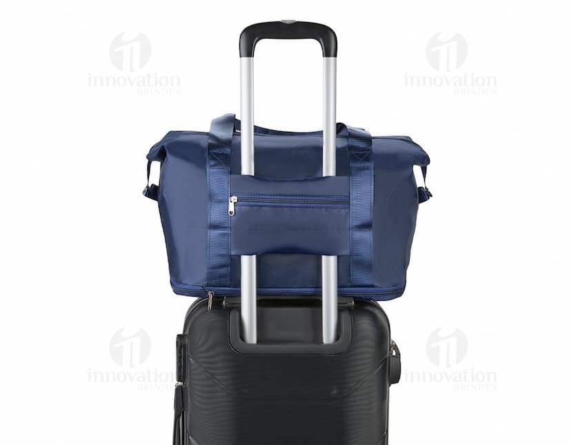 Bolsa expansível e dobrável de 25 litros.