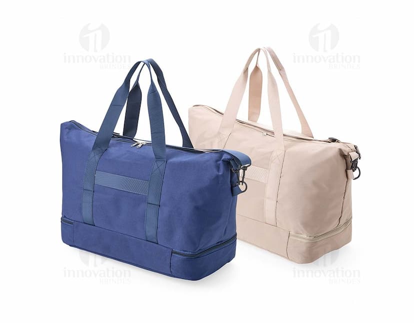 Bolsa Oxford 19 litros em cor azul, com alças de ombro e bolsos externos.