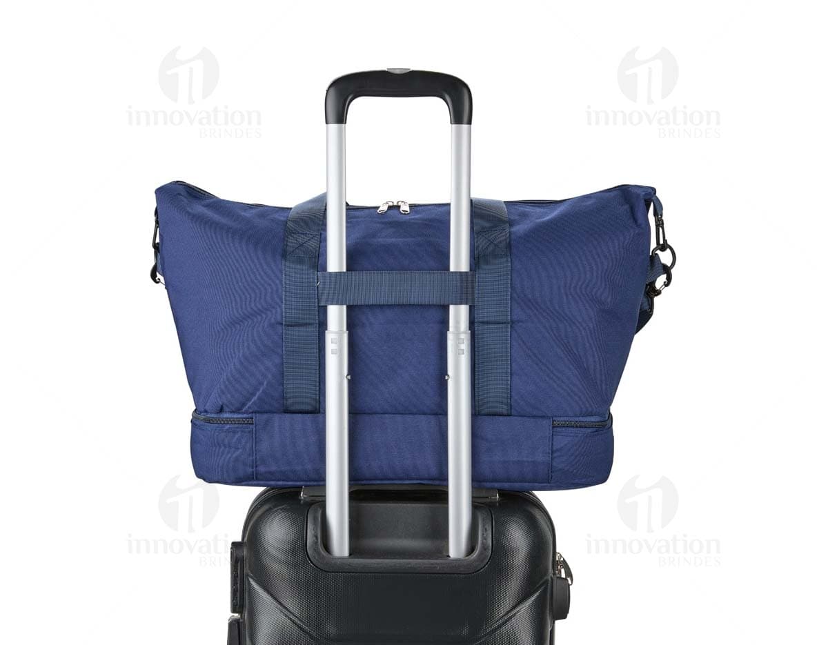 Bolsa Oxford 19 litros em cor azul, com alças de ombro e bolsos externos.
