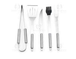 BBQ Set 5 Pieces - Set including knife, fork, tongs, spatula, and brush for BBQ on a wooden background.
