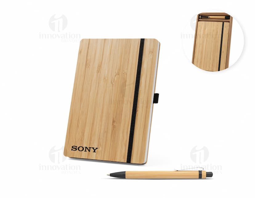 Kit de papelaria sustentável da marca Gaiman, composto por caderno, lápis e borracha, todos feitos com materiais reciclados.