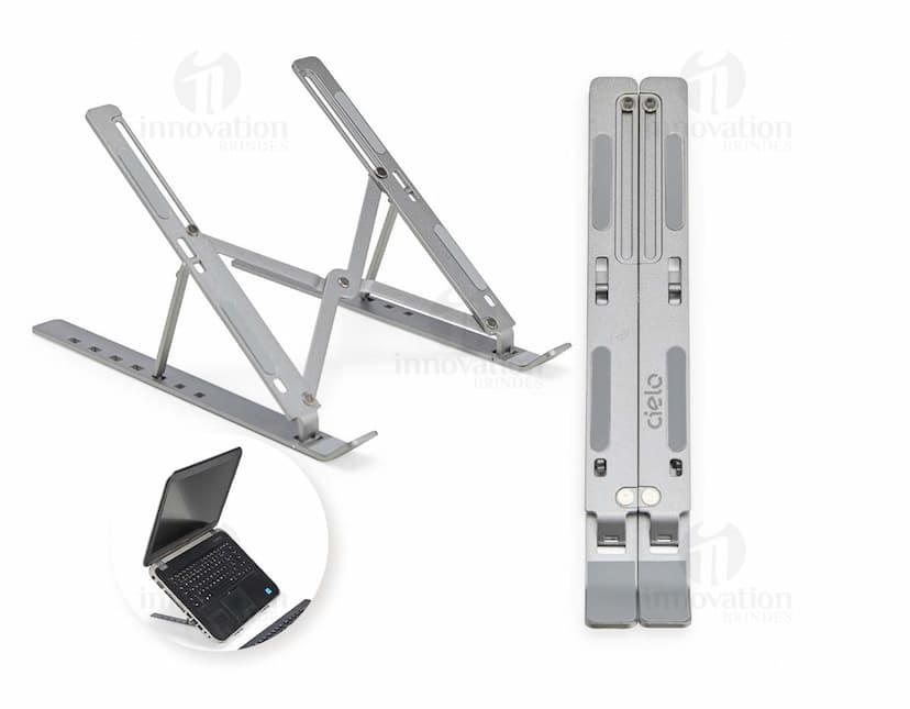 Suporte retrátil para notebook feito de metal e aço, sendo uma ferramenta tecnológica e moderna para facilitar o uso do dispositivo.