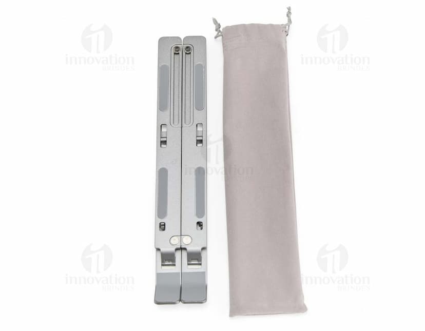 Suporte retrátil para notebook feito de metal e aço, sendo uma ferramenta tecnológica e moderna para facilitar o uso do dispositivo.