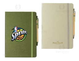 Rice fiber notebook with pen on a white background. The notebook is light brown with black details on the cover. The pen is