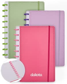 Caderno em disco vintage com capa rosa, decorado com elementos florais e listras amarelas. Páginas em branco, com espaço para escrever e desenhar. Perfeito para uso no escritório, na escola ou como diário.