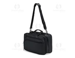 A smiling, well-dressed businessman holding a black leather backpack. He is standing in a studio and looks happy and