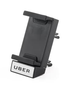 Suporte veicular para celular - 10: Mantenha seu smartphone sempre seguro e ao alcance das mãos enquanto dirige com este prático suporte veicular. Feito com material de couro de alta qualidade, ele é moderno, portátil e seguro, perfeito para quem busca praticidade e segurança no dia a dia. Nunca mais se preocupe em perder chamadas importantes ou se distrair procurando o celular enquanto dirige. Adquira já o seu e tenha mais tranquilidade nas suas viagens!