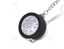 Chaveiro de plástico com trena - 01. Um brinde promocional perfeito para sua empresa! Este chaveiro prático e funcional