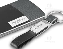 Kit Ejecutivo - 07: Conjunto moderno de artículos de oficina en plata y negro para comunicación y organización. Ideal para