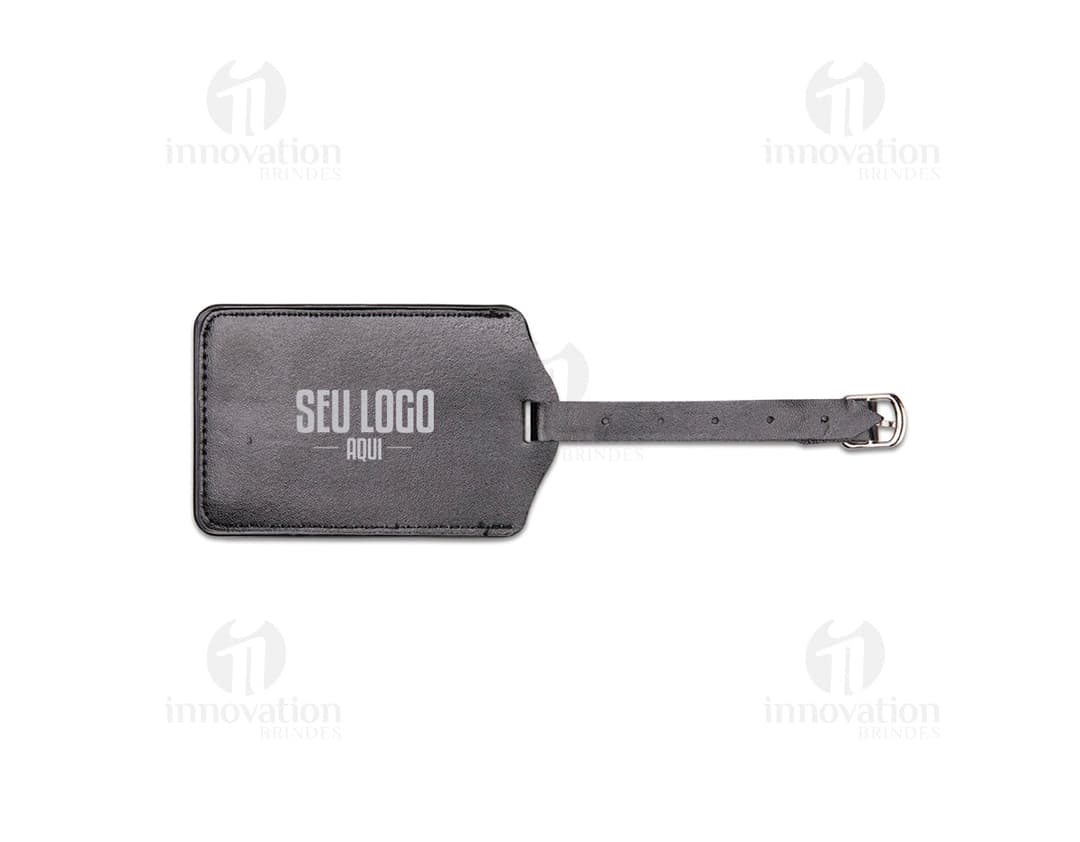 Black luggage identifier made of leather, with a closure and empty interior to insert information. With a compact and durable
