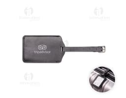 Black luggage identifier made of leather, with a closure and empty interior to insert information. With a compact and durable