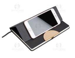Office kit containing a notebook, tech equipment, various items, mobile phone, makeup products, facial brush, nail polish