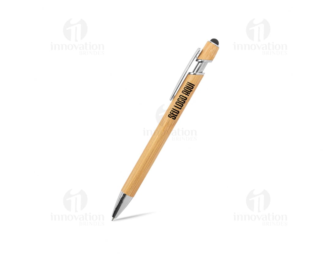 Yellow bamboo ballpoint pen on a black background. The item is made of bamboo and metal, serving as a writing and drawing