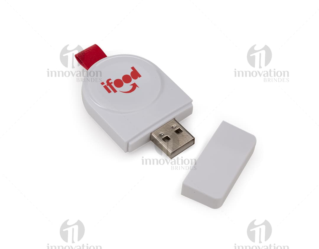 Um carregador por indução iWatch rodeado por equipamentos eletrônicos modernos, como laptops, smartphones, teclados