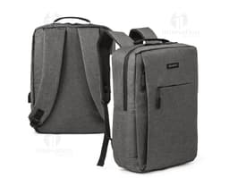 Mochila para notebook em couro marrom com alça ajustável e design elegante. Ideal para viagens ou uso no escritório