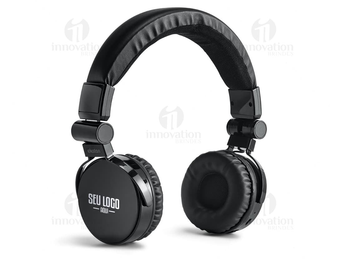 Wireless headphones with microphone in silver and black metal, modern technology, wireless, close up, ideal for listening to