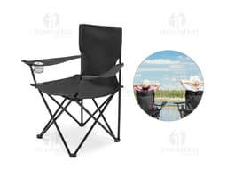 Black leather folding chair in a modern office environment, with a smiling executive man sitting in front of a desk with a