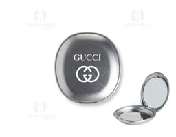 Espelho duplo sem aumento plástico em forma de círculo, vazio e brilhante. Utensílio de cozinha de metal, com design de