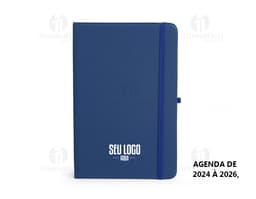 Planner Emborrachado Anual em design moderno e 3D, com espaço para armazenamento de dados digitais em notebook e videodisk.