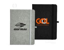 Linen notebook with pen holder, in neutral colors, with protective cover, blank pages, and elastic closure. Ideal for office
