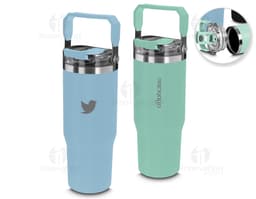 Red thermal water bottle with a screw-on lid and carrying handle. The bottle is on a wooden table, and in the background, a
