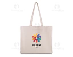 Pink cotton tote bag, empty, with handles and elegant design. Targeted towards a female audience, perfect for shopping in