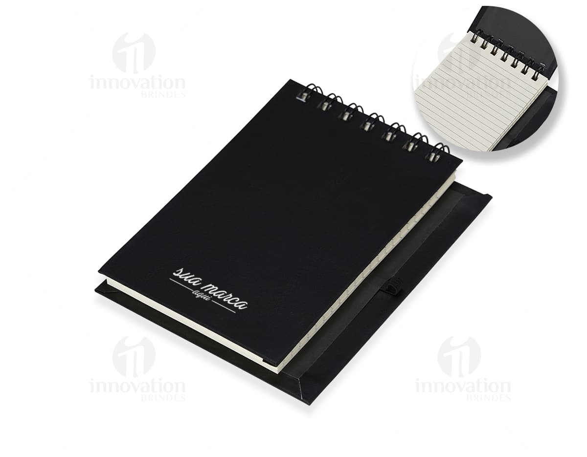 Bloco Eco Caneta e Notas Autoadesivas em formato retangular com capa de material reciclado, contendo caneta e diversas folhas autocolantes de cores variadas.