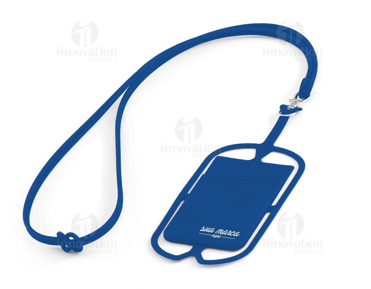 Porta cartões de silicone com cordão de 420mm em tons de azul e verde. O objeto tem capacidade para vários cartões e possui um cordão para pendurar no pescoço. Porta cartões de silicone com cordão de 420mm em tons de azul e verde. O objeto tem capacidade para vários cartões e possui um cordão para pendurar no pescoço.