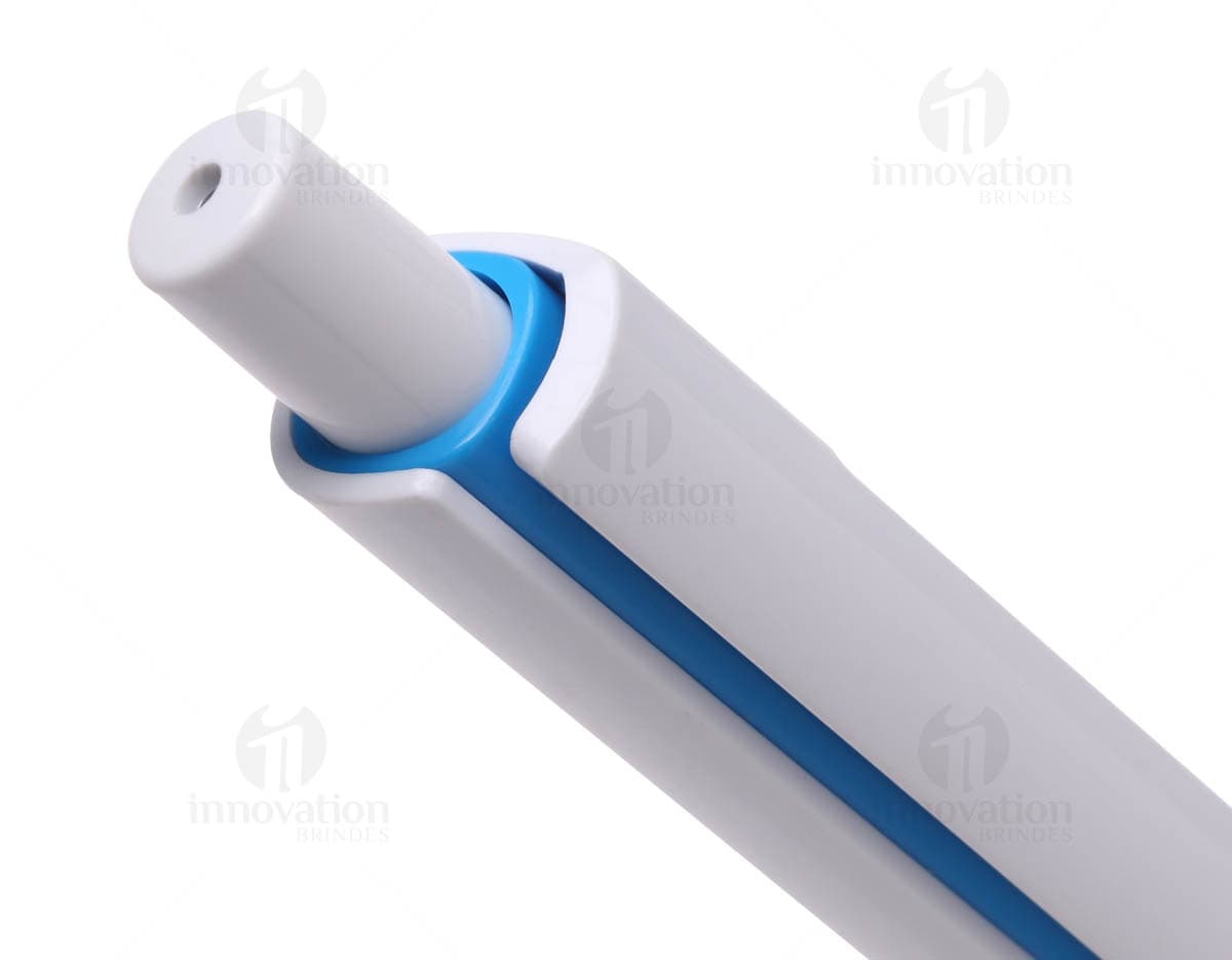 Caneta esferográfica plástica retrátil em tons de azul e preto. Caneta esferográfica plástica retrátil em tons de azul e preto.