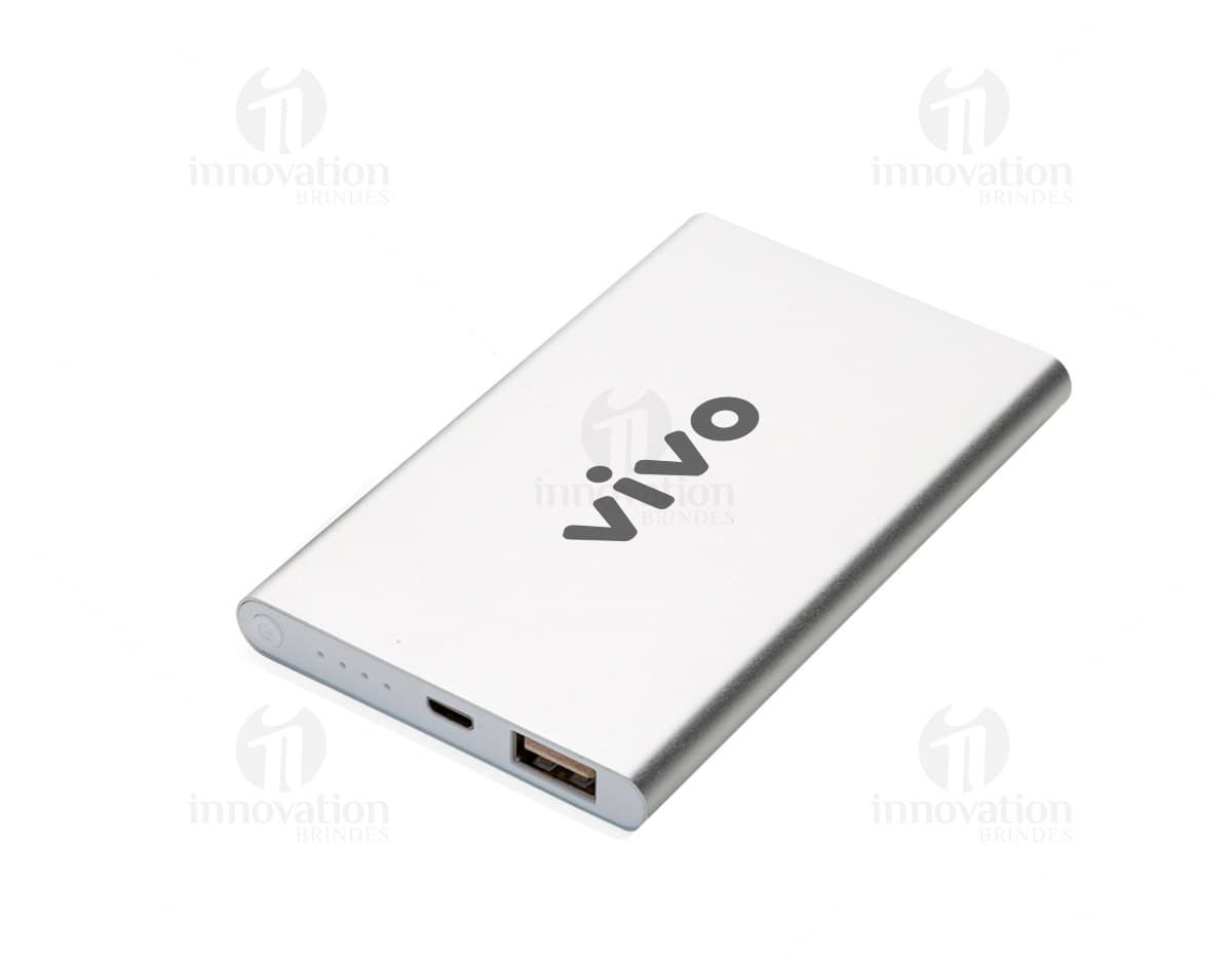 Power bank 2000mAh silver color, portable electronic device with metal case and USB port for charging mobile devices. Ideal for business, office, or personal use. Power bank 2000mAh silver color, portable electronic device with metal case and USB port for charging mobile devices. Ideal for business, office, or personal use.