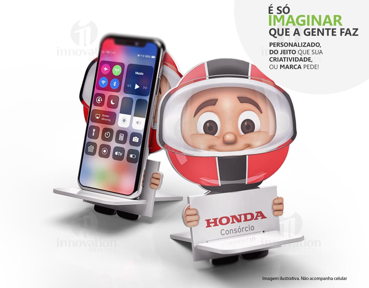 Suporte retrátil para celulares em cor preta. O suporte está fixado em uma mesa e possui ajuste de tamanho para diferentes modelos de celulares. Suporte retrátil para celulares em cor preta. O suporte está fixado em uma mesa e possui ajuste de tamanho para diferentes modelos de celulares.